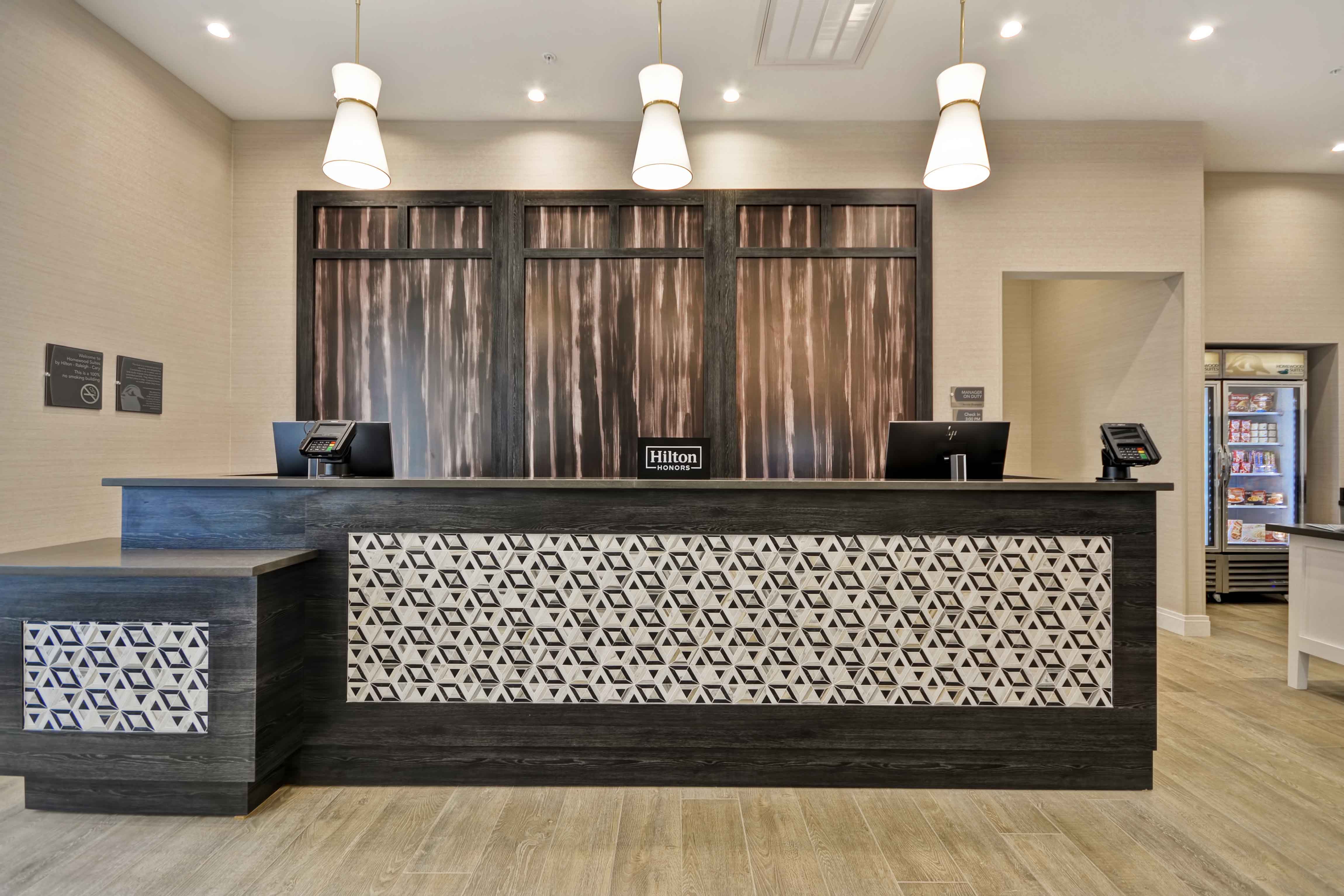 Front Desk homewood suites cary nc designers - J. Banks Design Group